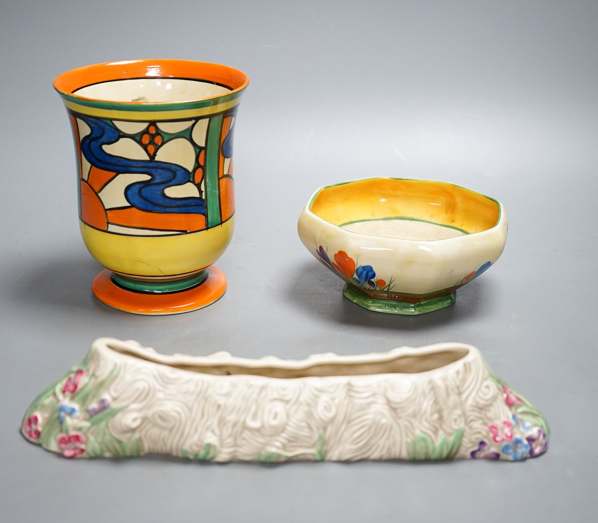 A Clarice Cliff Fantasque vase and two other Clarice cliff items